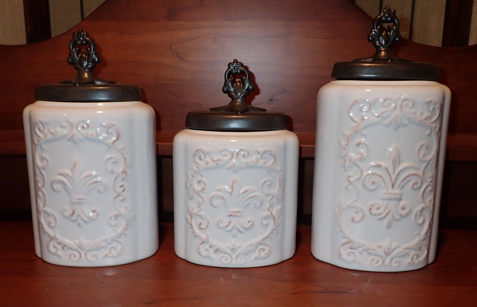 American Atelier Canisters: Largest are approx 4 3/4" x 6 1/4" x 11" tall. No shipping