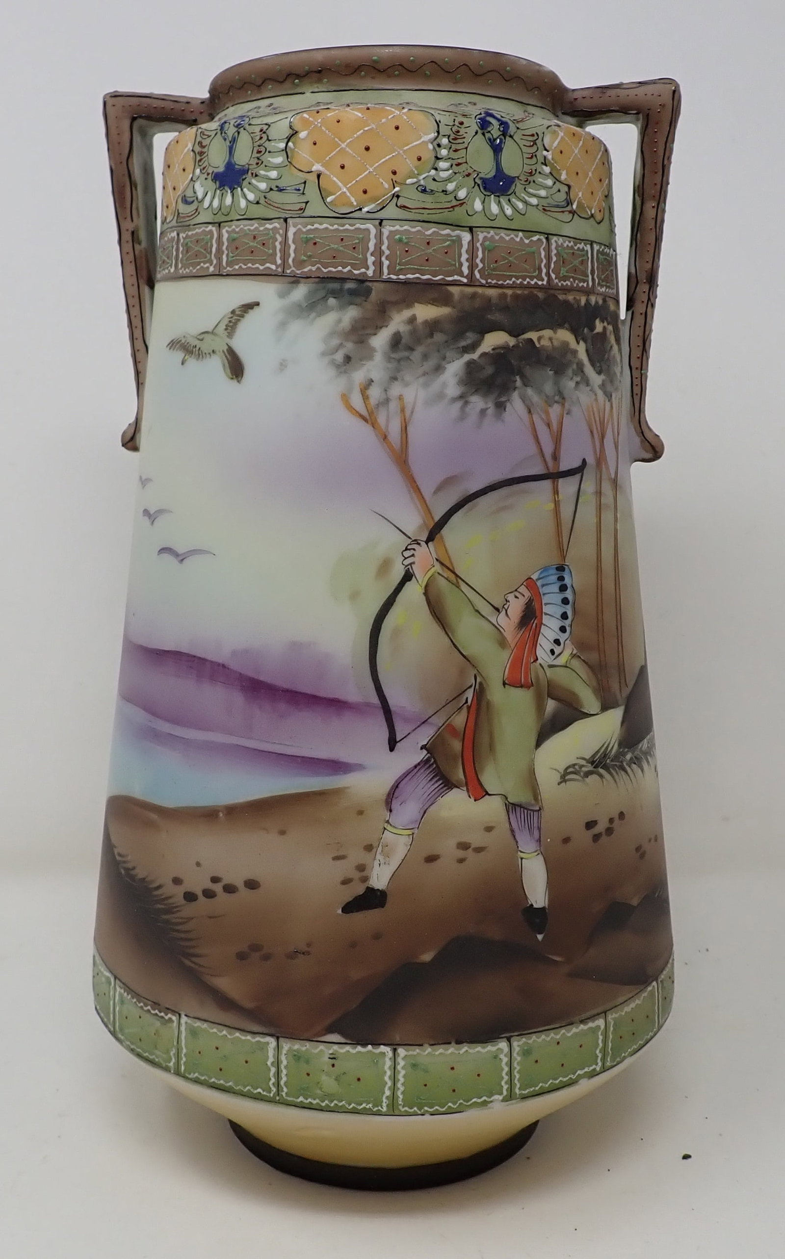 Nippon Vase w/ Painted Indian Shooting Bow: Approx 5 1/2" in diameter and 9 1/2" tall.