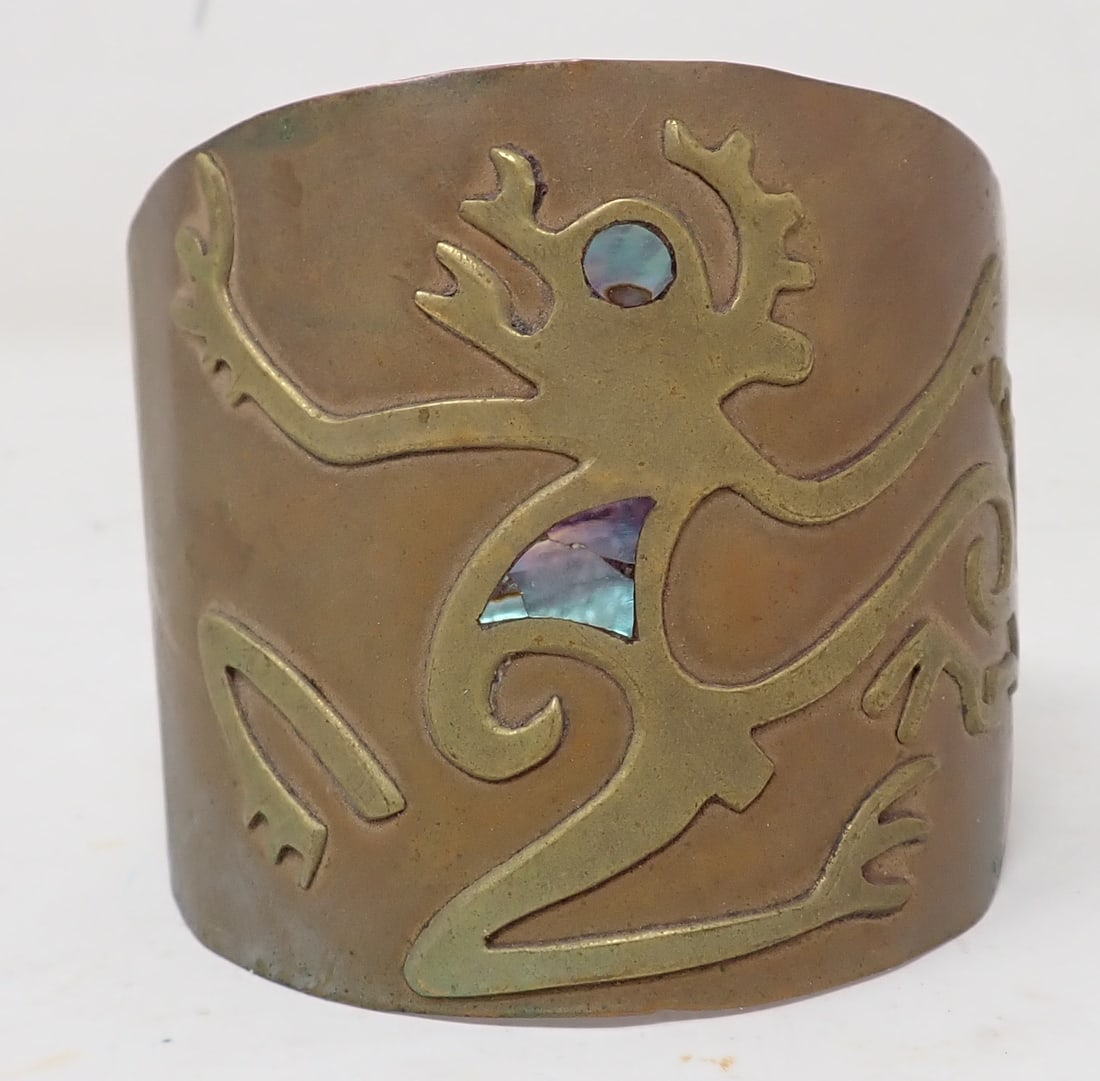 Mexican Brass & Copper Bracelet: Approx 2 1/2" x 2 7/8" , with a 1 1/4" opening