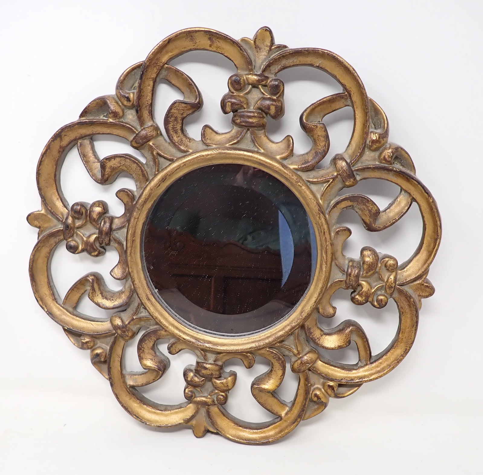 Gold Decorator Mirror: Approx 14 1/8" x 14 1/4". Made of a composite