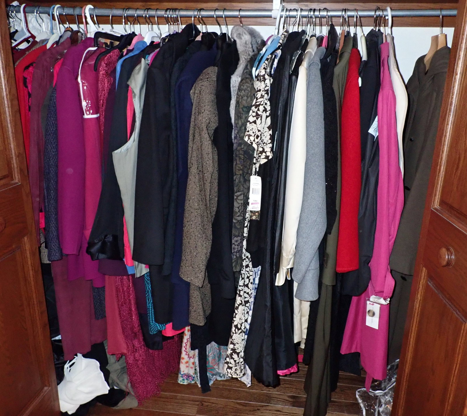 Ladies Clothing Closet w/ Coats Jackets & Misc: Looked at some sizes and they are 20w , 3x , 2x . Must take all and remove from second floor. No shipping