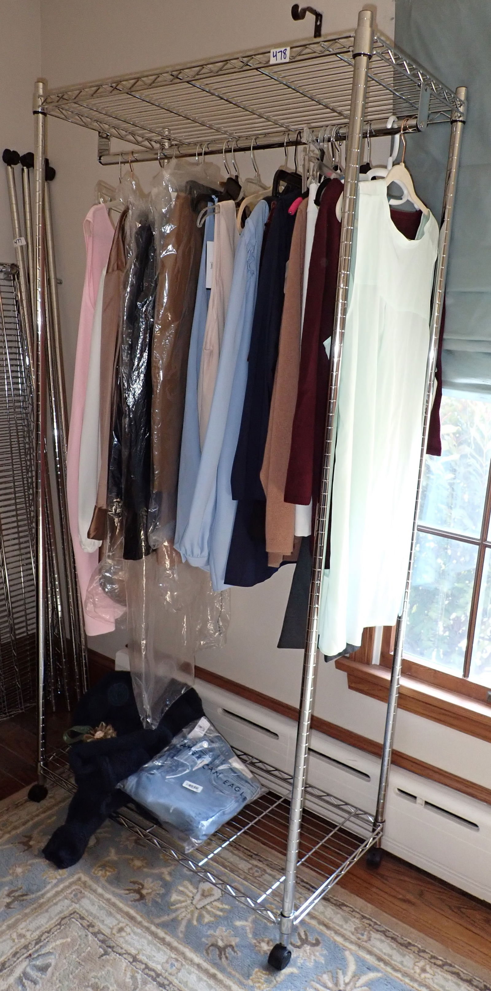 Clothing Rack: Does not include items on it. Approx 18" x 35 1/2" x 74 7/8" tall. No shipping
