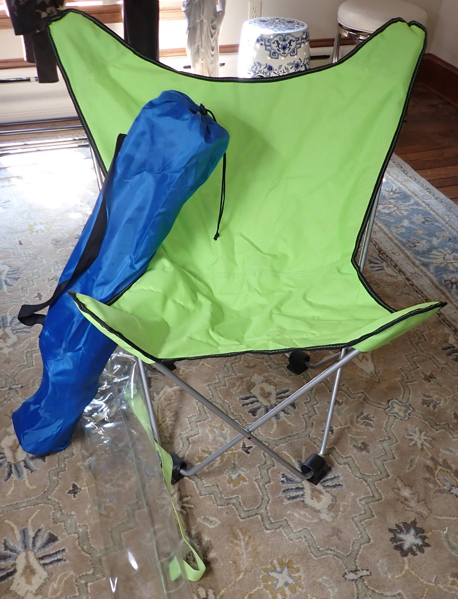 2 Folding Chairs: They are not the same style chairs. No shipping