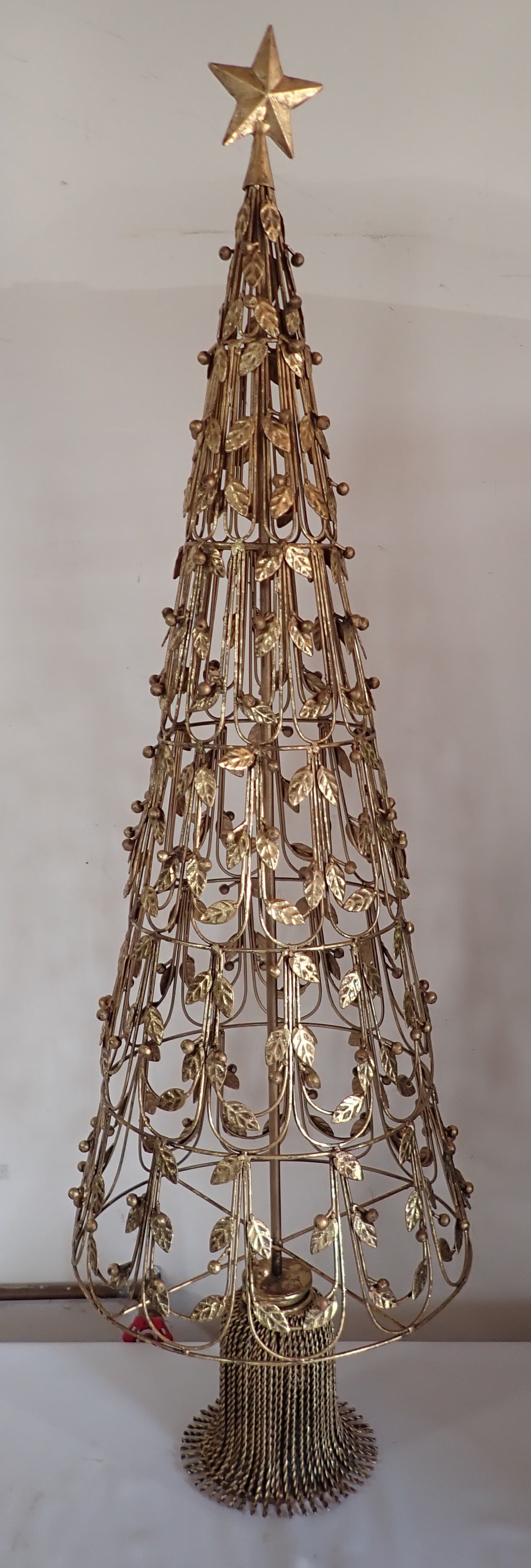 Decorator Christmas Tree in Gold Tone: Approx 47 1/2" tall. No shipping