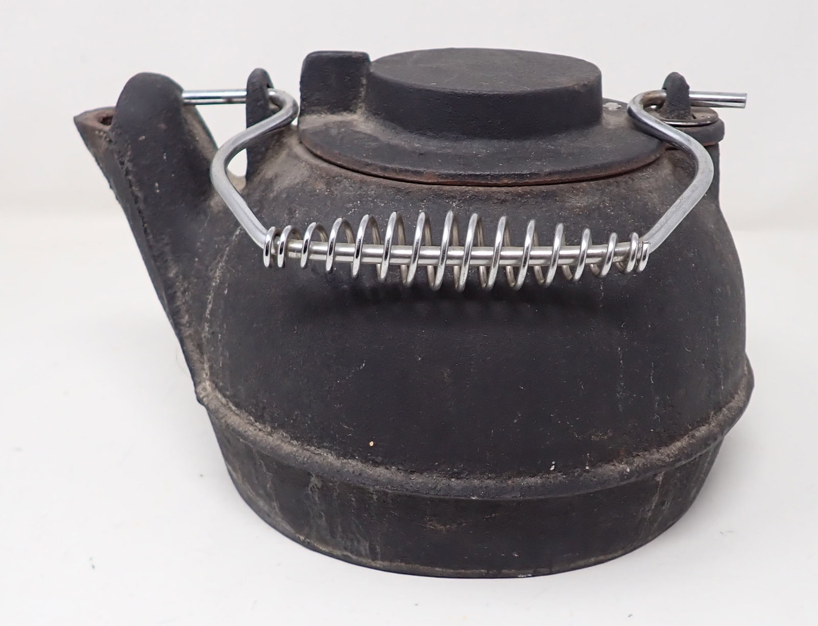 Cast Iron Tea Kettle: Approx 8" in diameter and 6 1/2" tall. Made in China