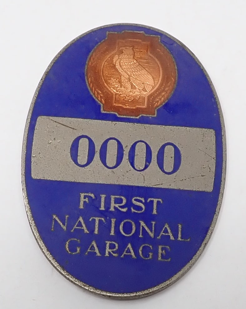 First National Garage 0000 License Plate Badge (1 of 3)