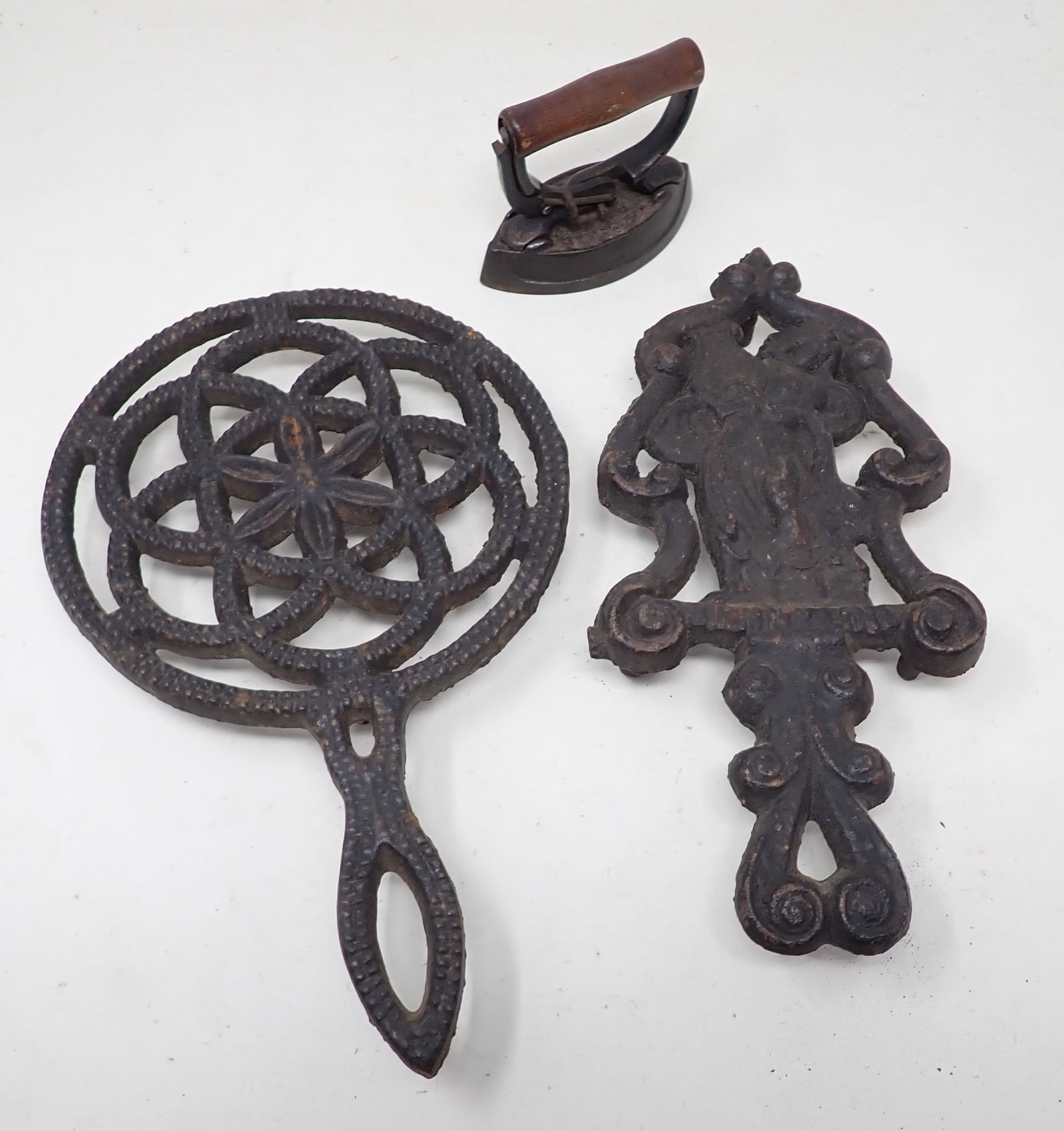 Cast Iron Trivets Incl Jenny Lind: Right one is apprx 5" x 10 1/4"
