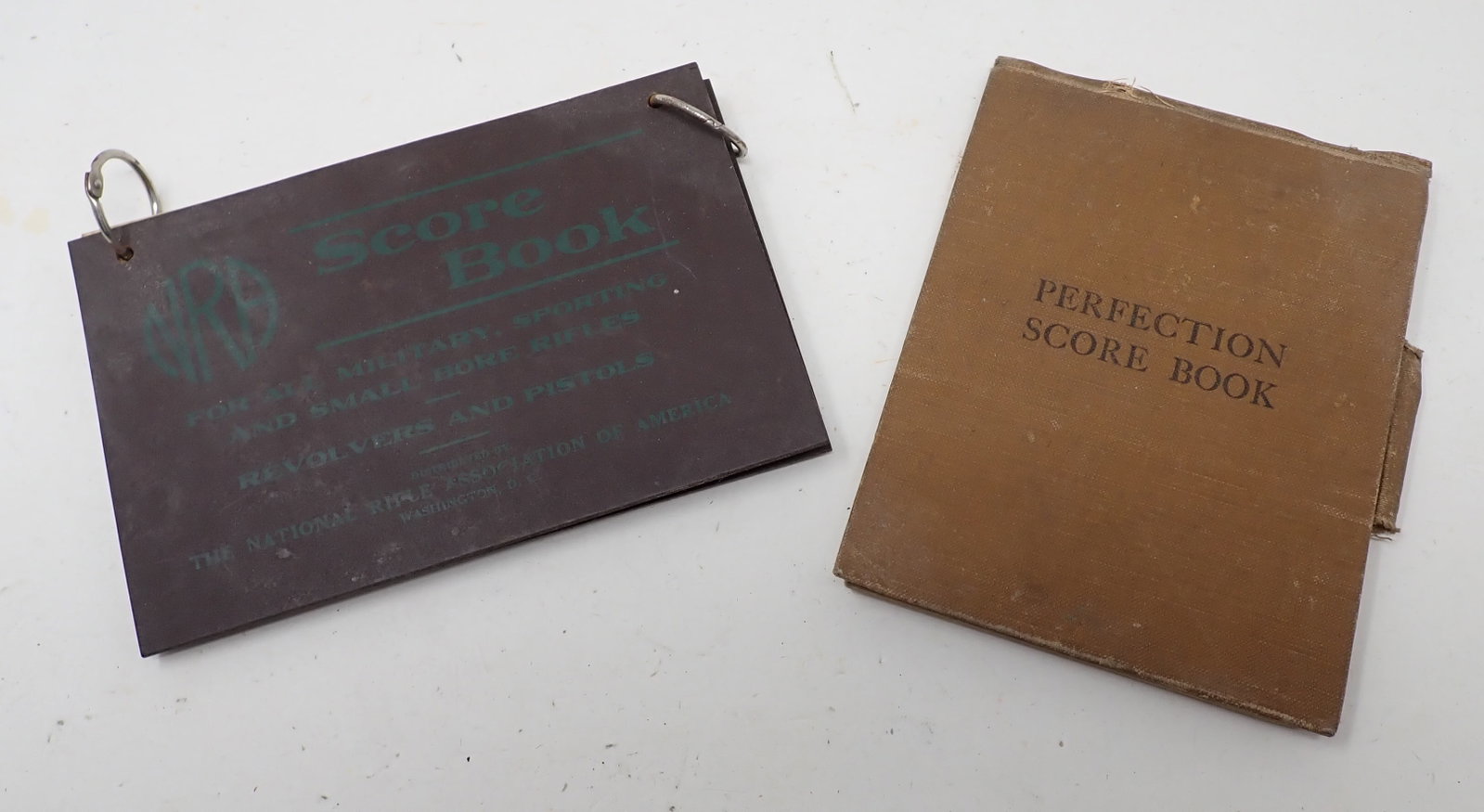 Pistol Revolver Scorebooks w/ Thompson Machine Gun Ad: Left one is approx 4 1/4" x 6 1/4"