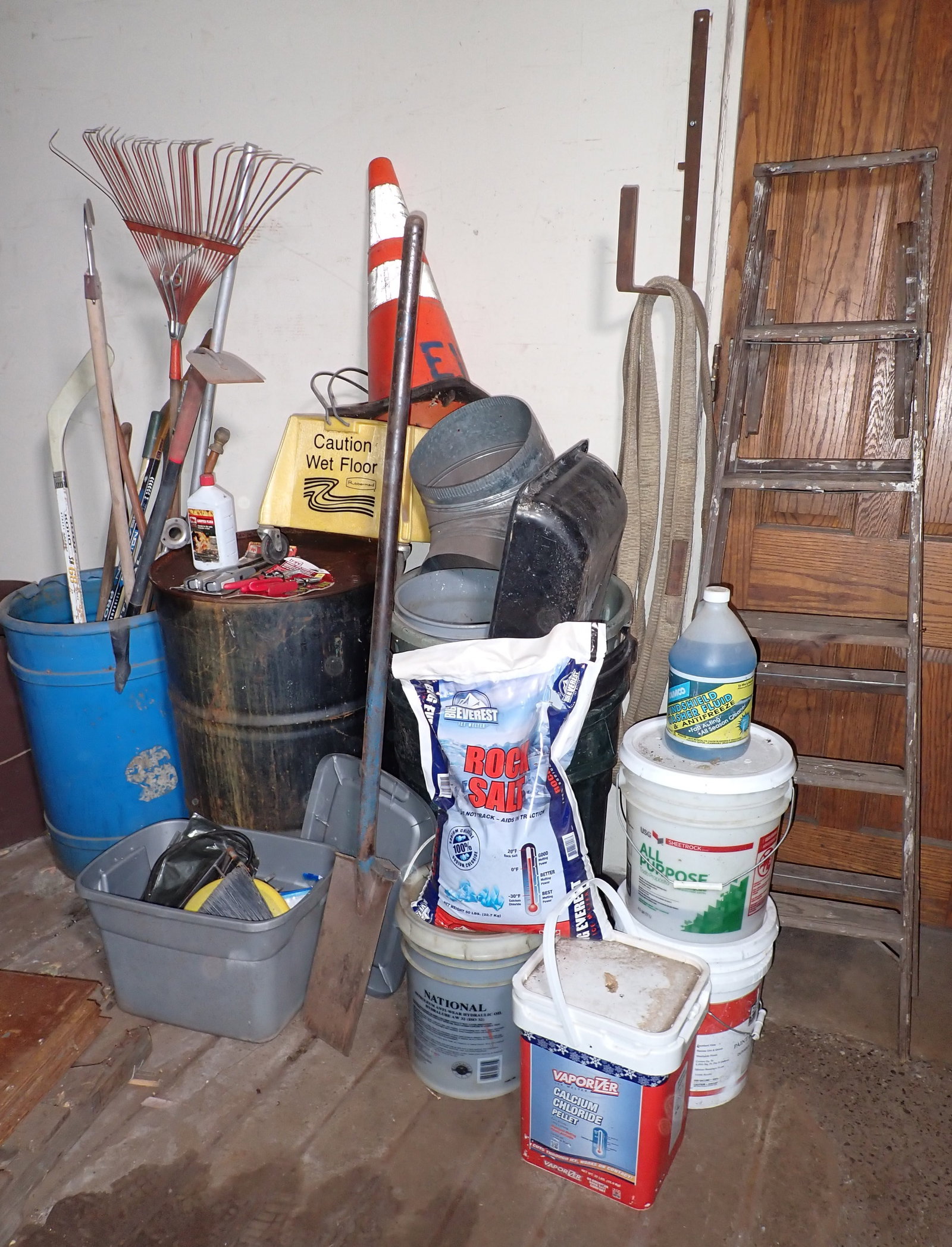 Wooden Ladder Hockey Sticks Rock Salt & Misc: Drum has a little liquid in it. 5 gallon buckets have some liquid. Must take all. No in house shipping !