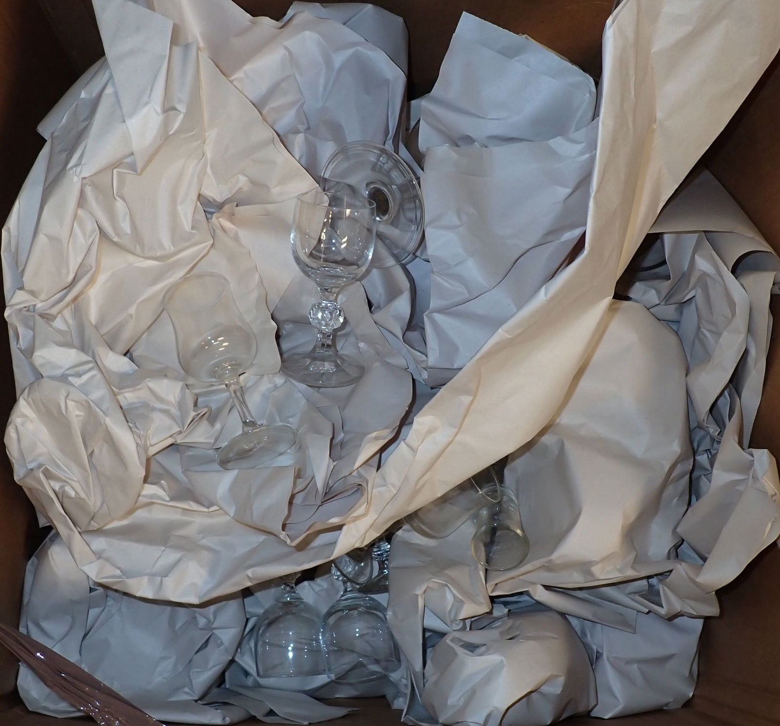 Boxes of Stemware Glassware & Coffee Mugs: Largest box is apprx 19" x 20" x 29" and is 3/4 full. We only unwrapped a couple. Must take all ! No in house shipping !