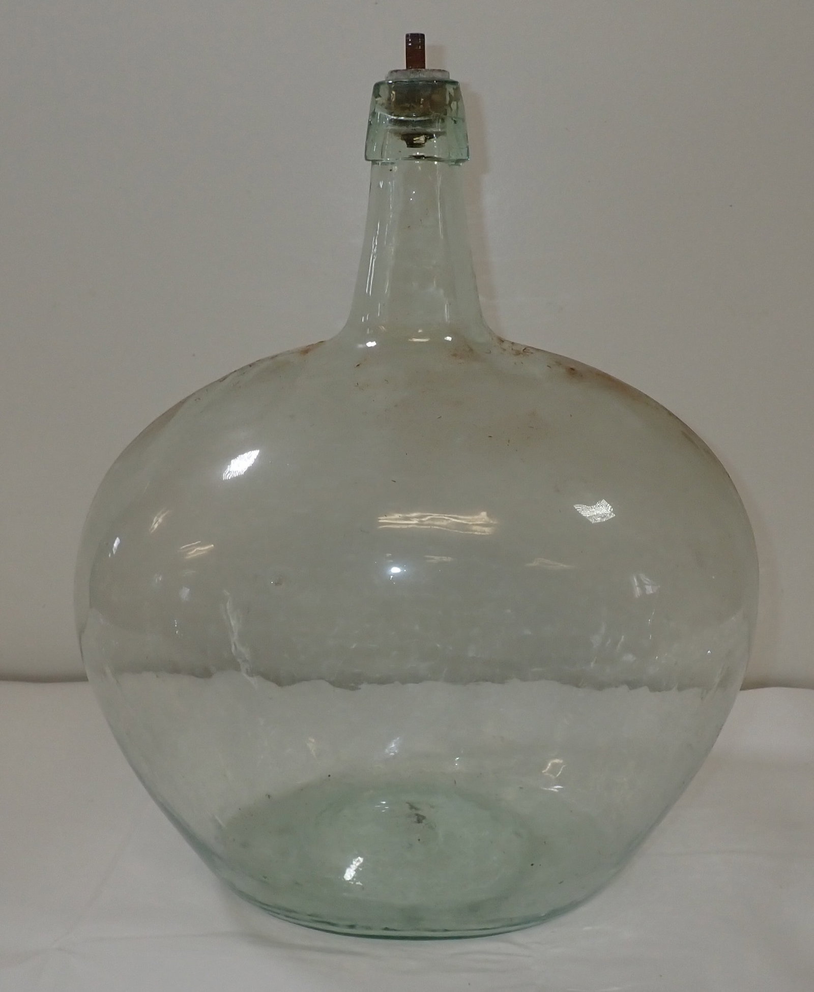 Demijohns Glass Bottle: Apprx 10" x 15" x 18" tall. Had a light fixture in it at one point.