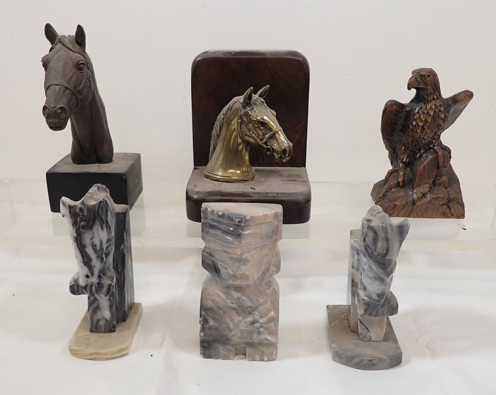 Bookends: Back left one is apprx 8 1/4" tall.