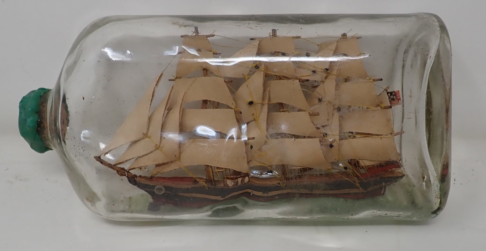 Ship in A Bottle: Approx 2 5/8" x 4 5/8" x 9 1/2"