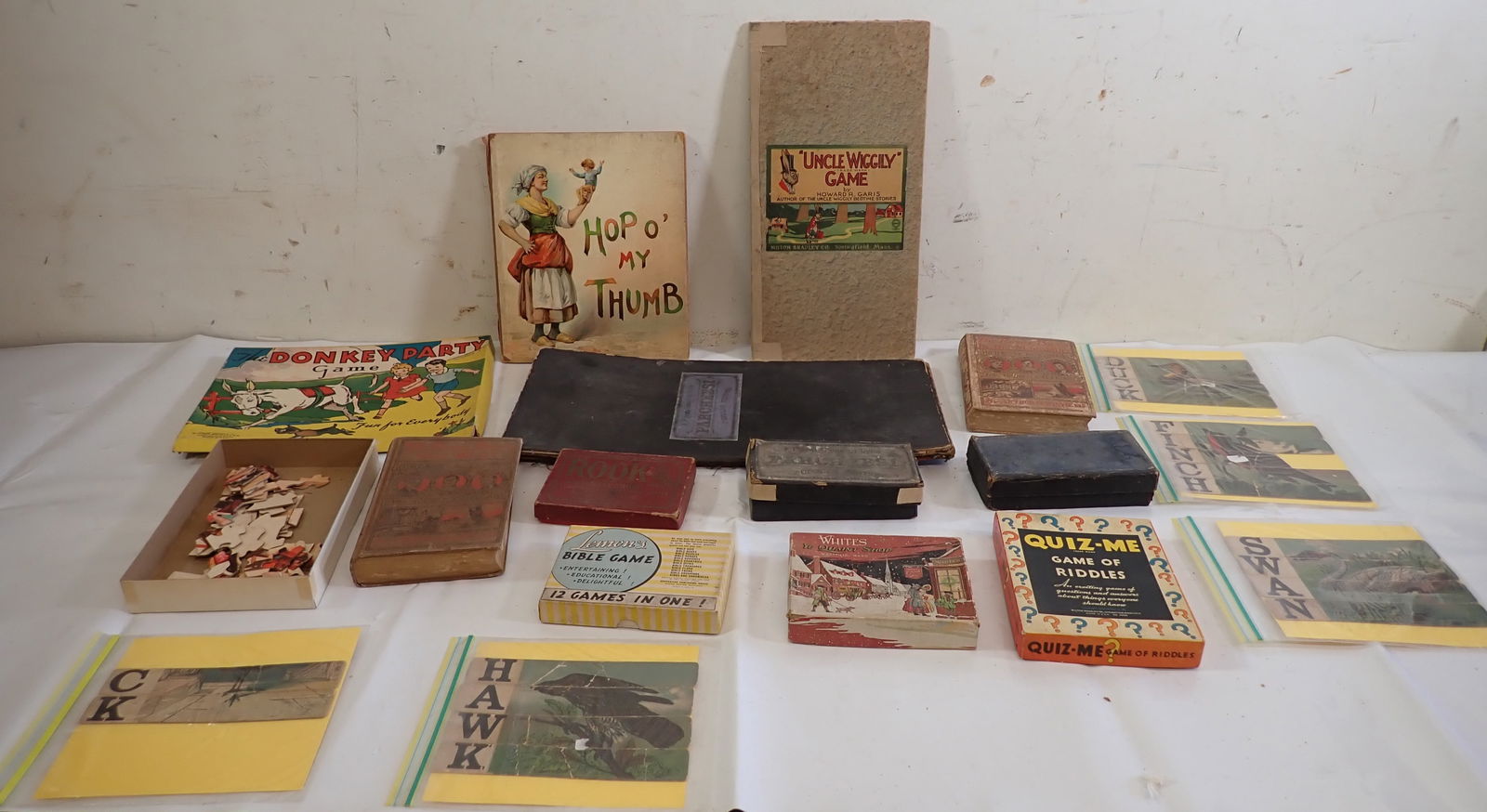 Games Books & Puzzles: We do not guarantee games are complete. Whites Quaint Shop box is empty.