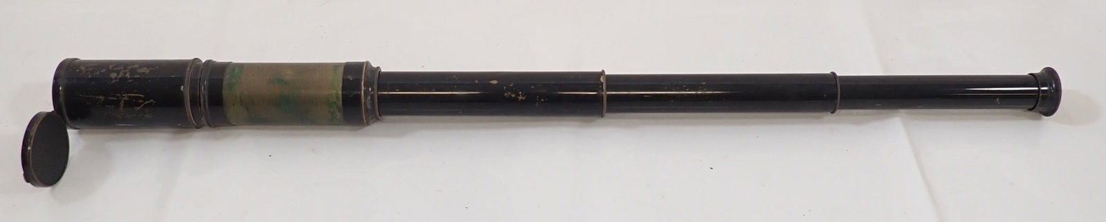 Brass Telescope: Approx 2" in diameter and 29 1/4" long when fully opened.