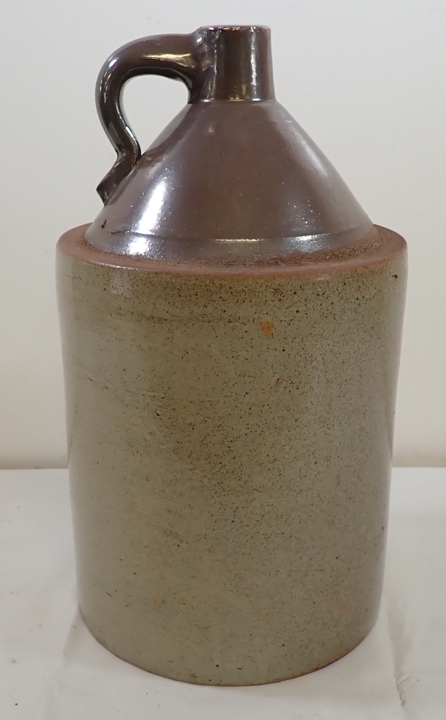 Stoneware Jug: Approx 20" tall. No in house shipping !