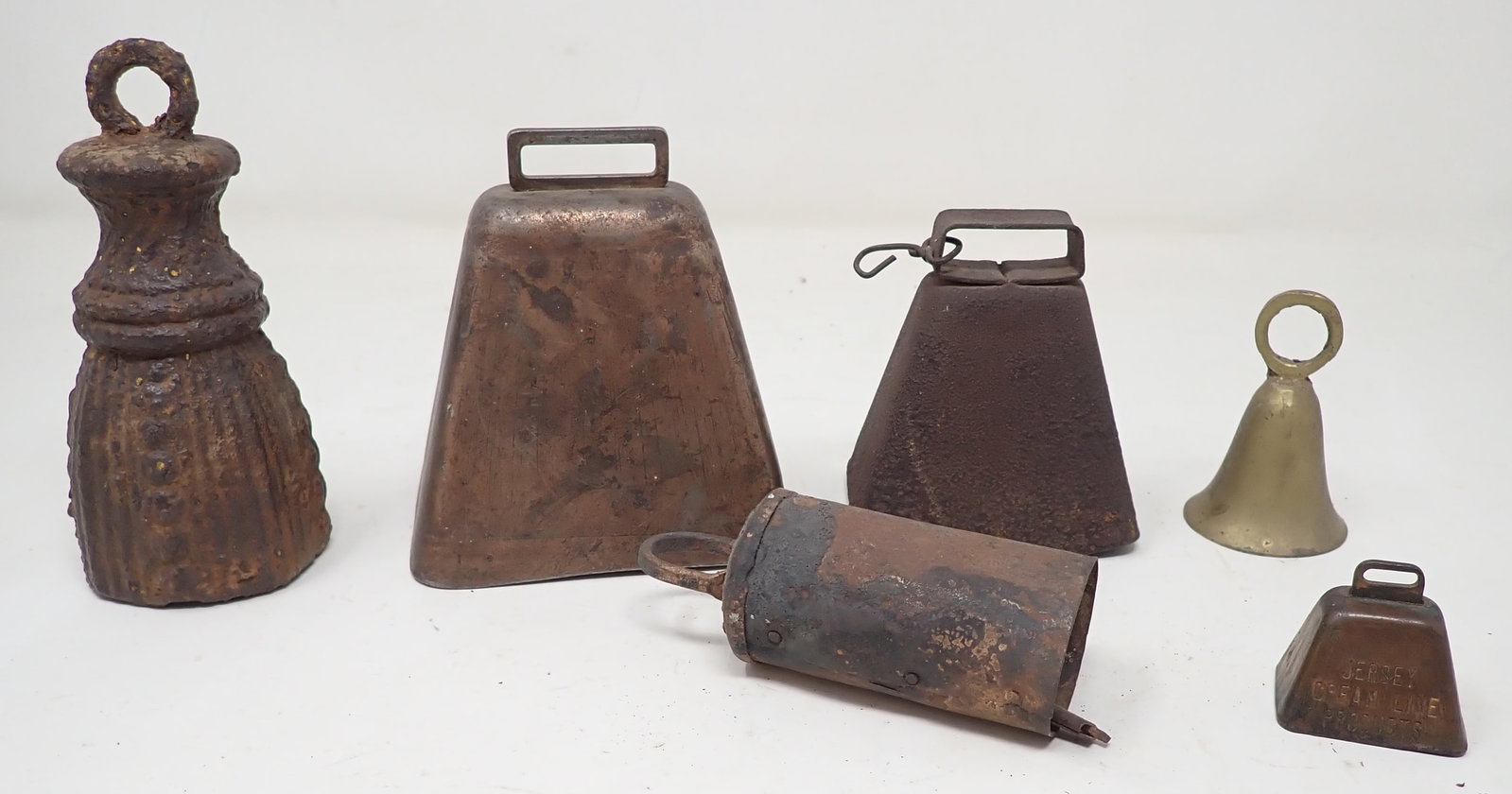 Goat Bells incl Jersey Cream Line & Cast Iron: Cast Iron Bell on left is approx 5 1/4" tall.