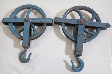 2 Iron Pulleys