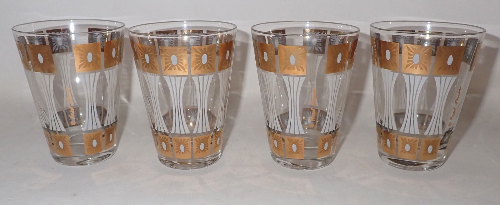 4 Fred Press Juice Glasses (1 of 2)