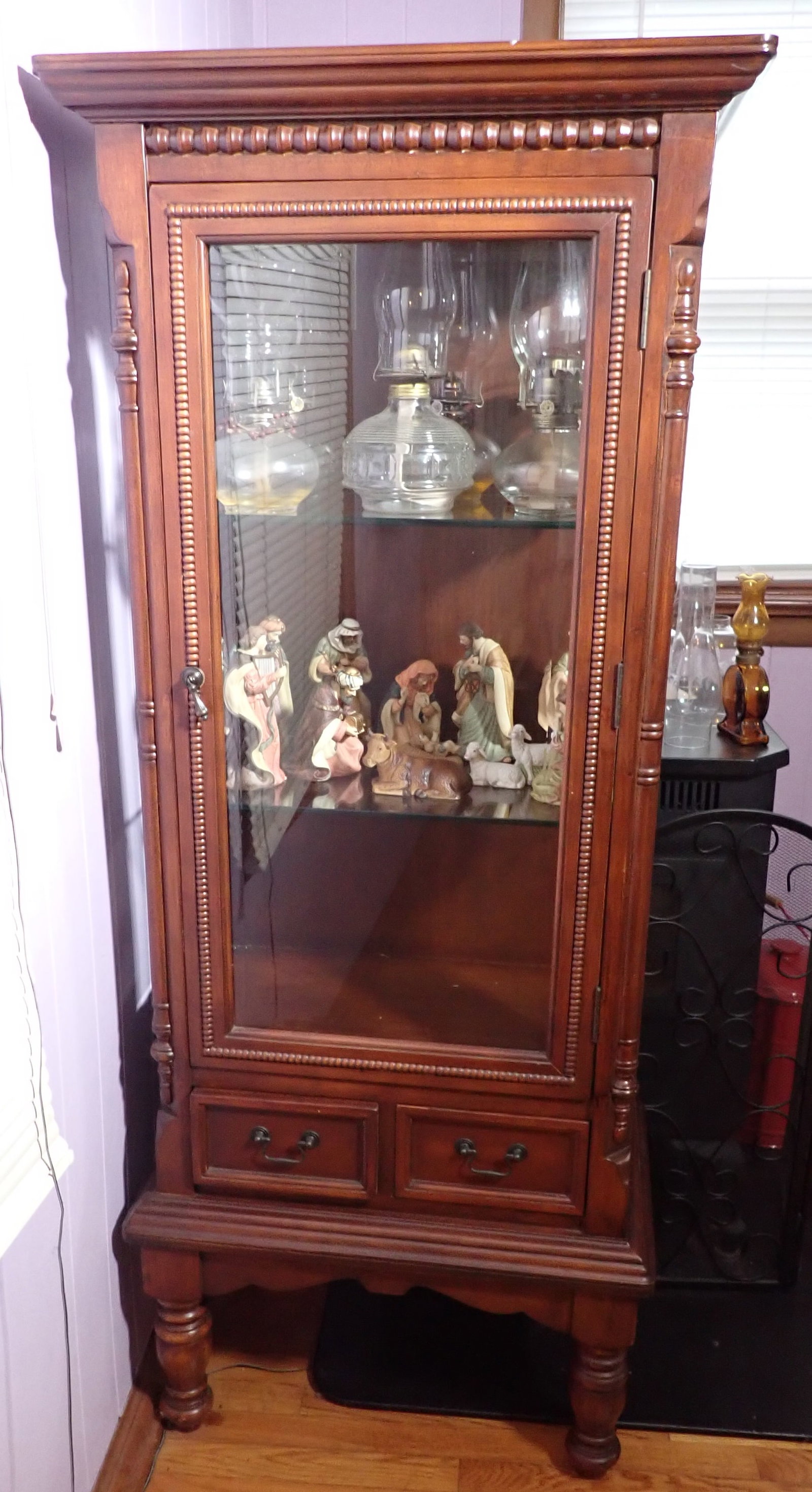 Curio Cabinet: Approx 16 1/8" x 26 1/4" x 62 7/8" tall. All pieces of glass are beveled. Does not include items in it. Buyer to bring help to remove AFTER 1pm. No in house shipping.