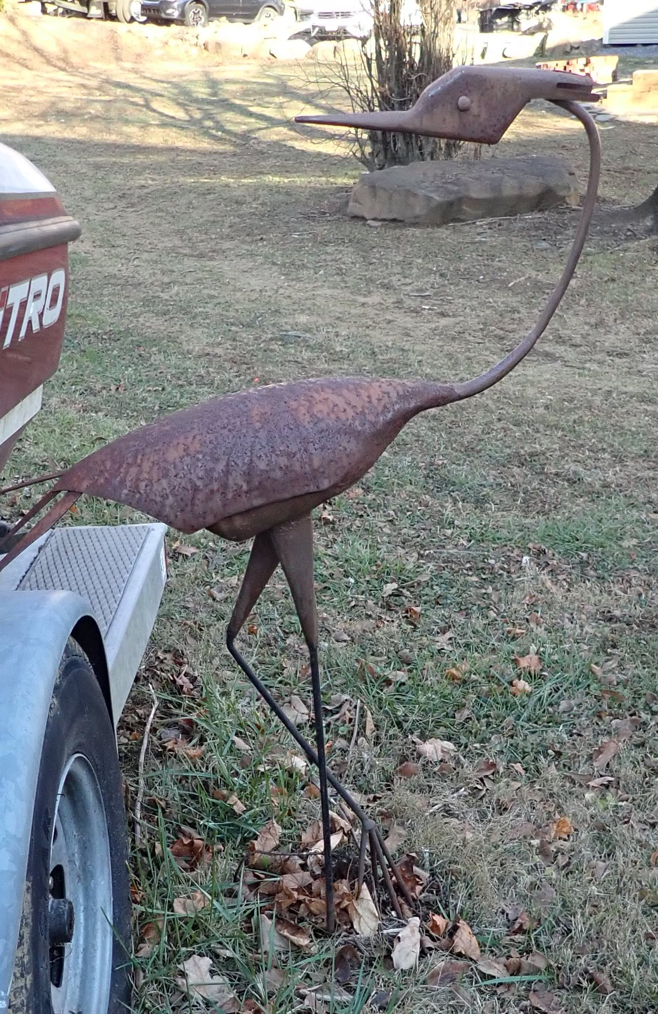 Metal Stork Yard Art: Apprx 46" tall. If snow/ice is on ground by pick up time, buyer is responsible for digging items out. No in house shipping