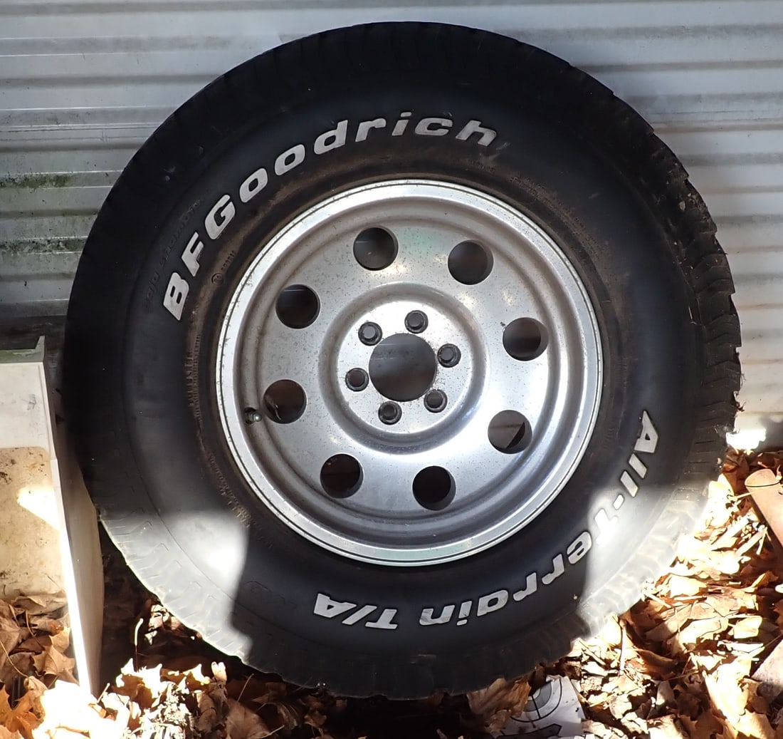 Set of 4 Aluminum Truck Rims & Tires: If snow/ice is on ground by pick up time, buyer is responsible for digging items out. I was told these came off a Dodge Dakota. I can not guarantee it. Sold as pictured, with No guarantees. No in hous