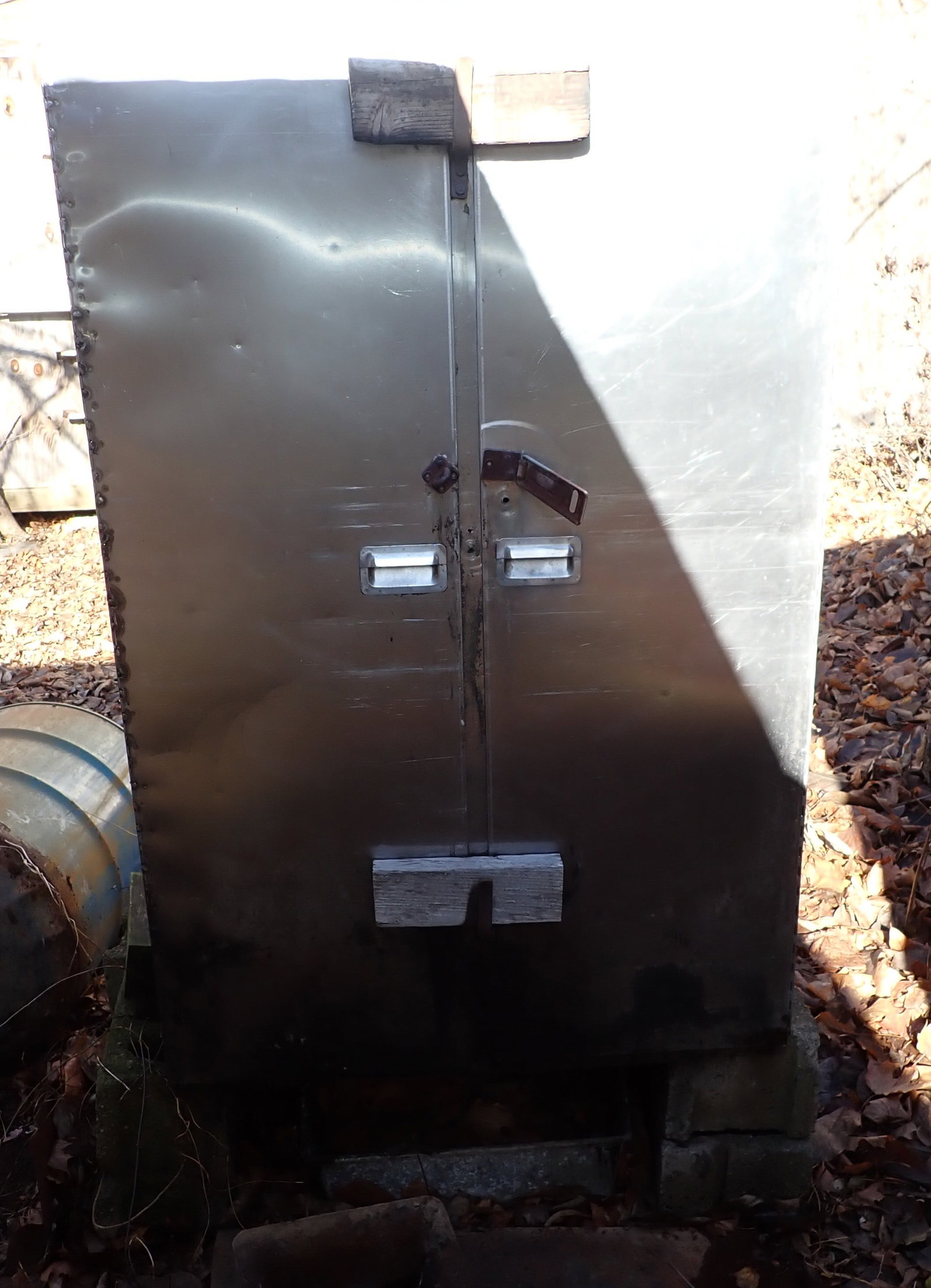 Home Made Stainless Steel Smoker: Approx 23" x 37" x 56 1/4" tall. Bring help to remove. If snow/ice is on ground by pick up time, buyer is responsible for digging items out. No in house shipping