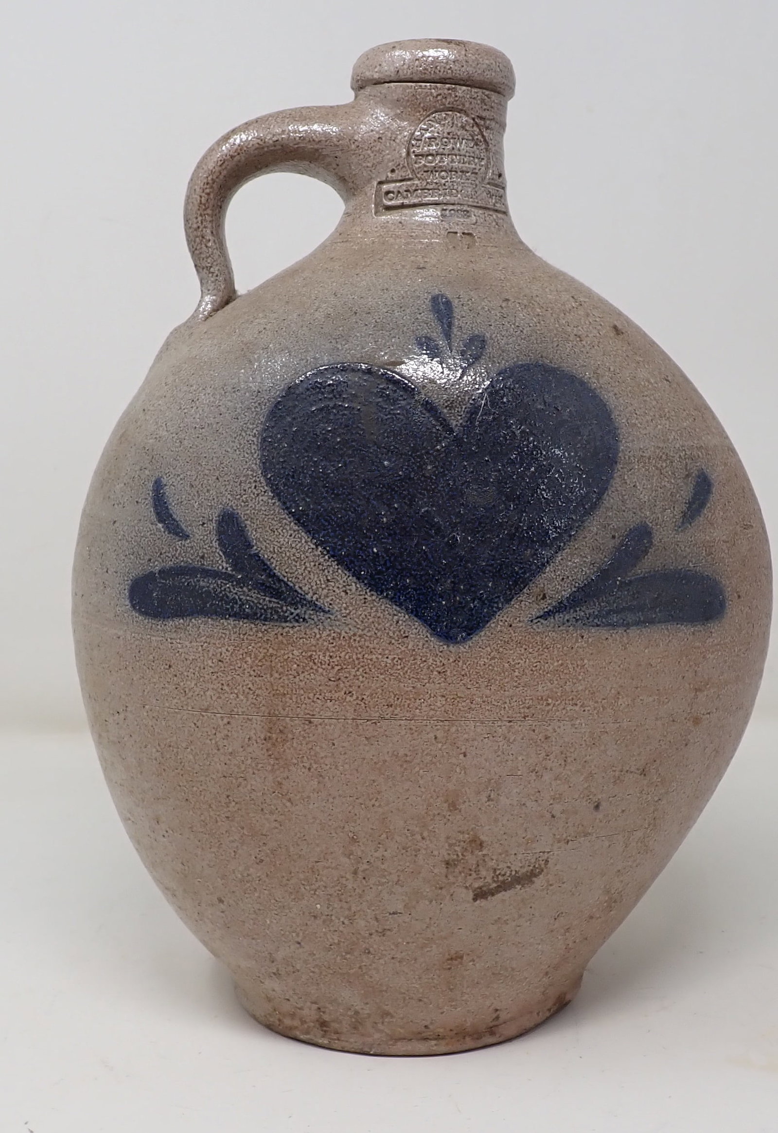 1983 Rowe Pottery Ovoid Jug w/ Heart: Approx 10 1/2" tall. Shipping available