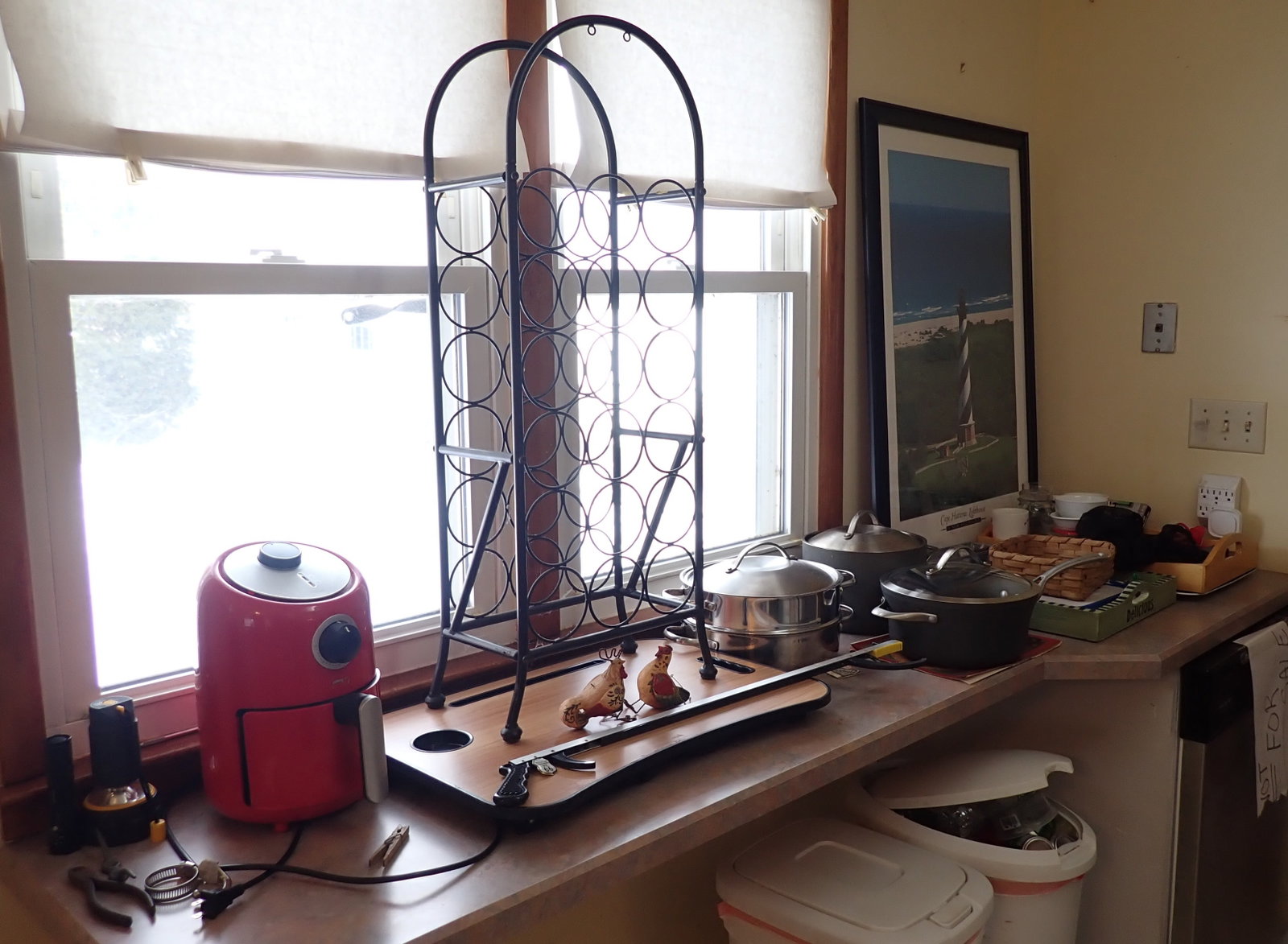 Wine Rack Pots Pans Misc Counter Contents: Wine rack is apprx 8" x 15" x 36" . Take what you want and leave the rest. No in house shipping !