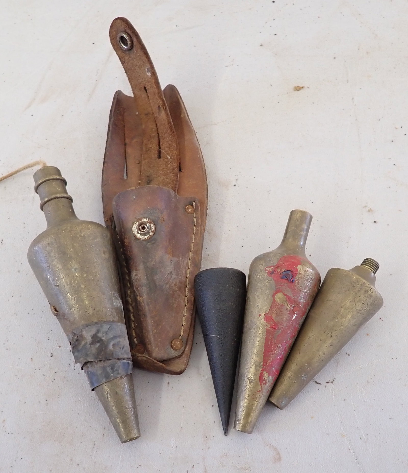 Plumb Bobs: Largest is apprx 1 3/4" in diameter and 6 1/4" long. Shipping available