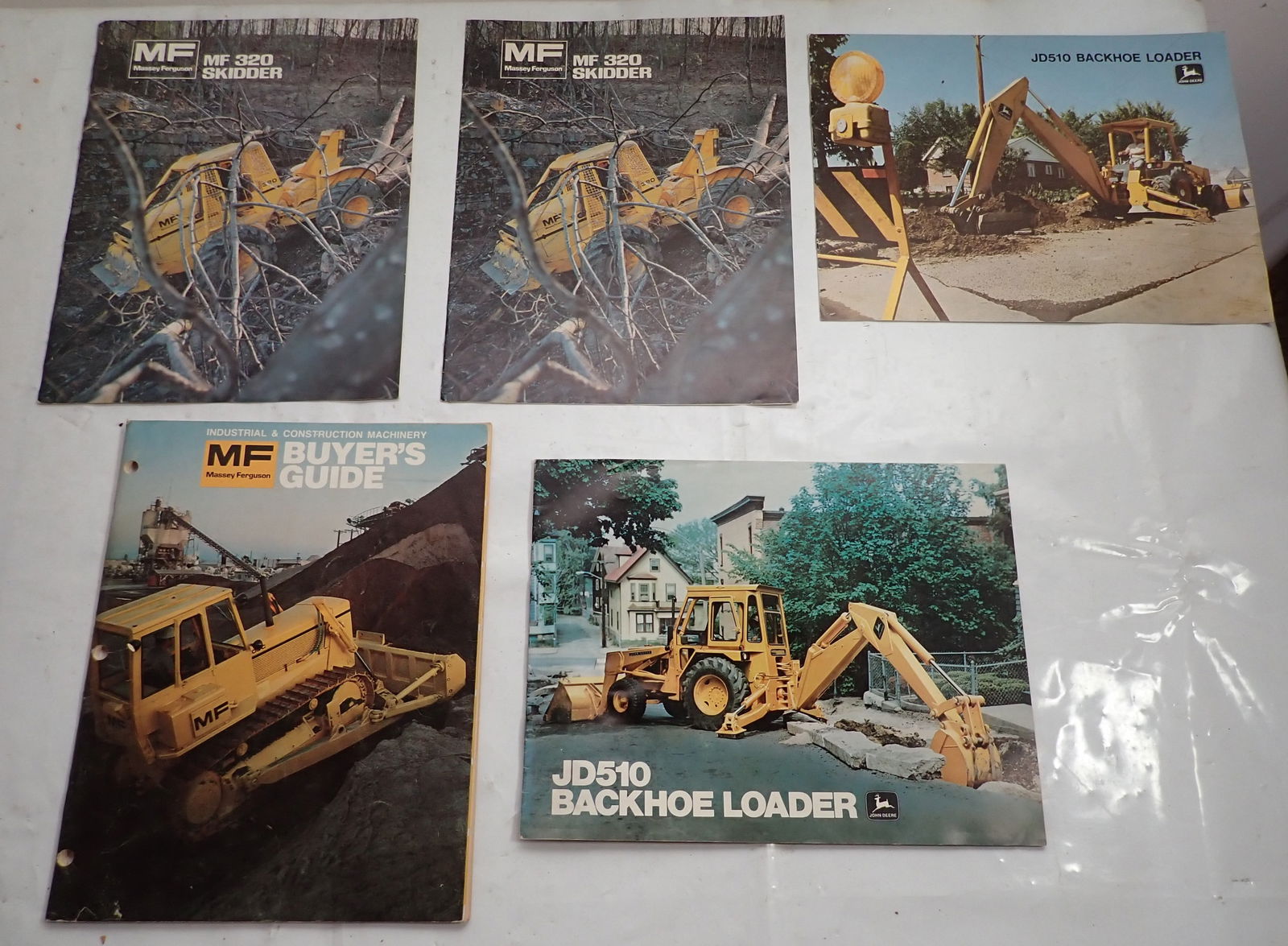 John Deere Backhoe Massey Ferguson Skidder Brochures (1 of 1)
