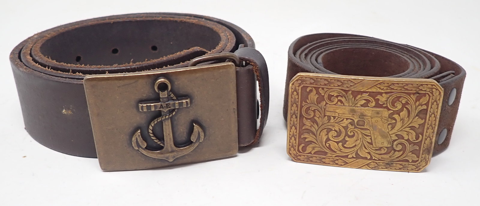 Pistol & Nautical Anchor Belt Buckles: Anchor buckle is apprx 1 3/4" x 2 3/8". Shipping available