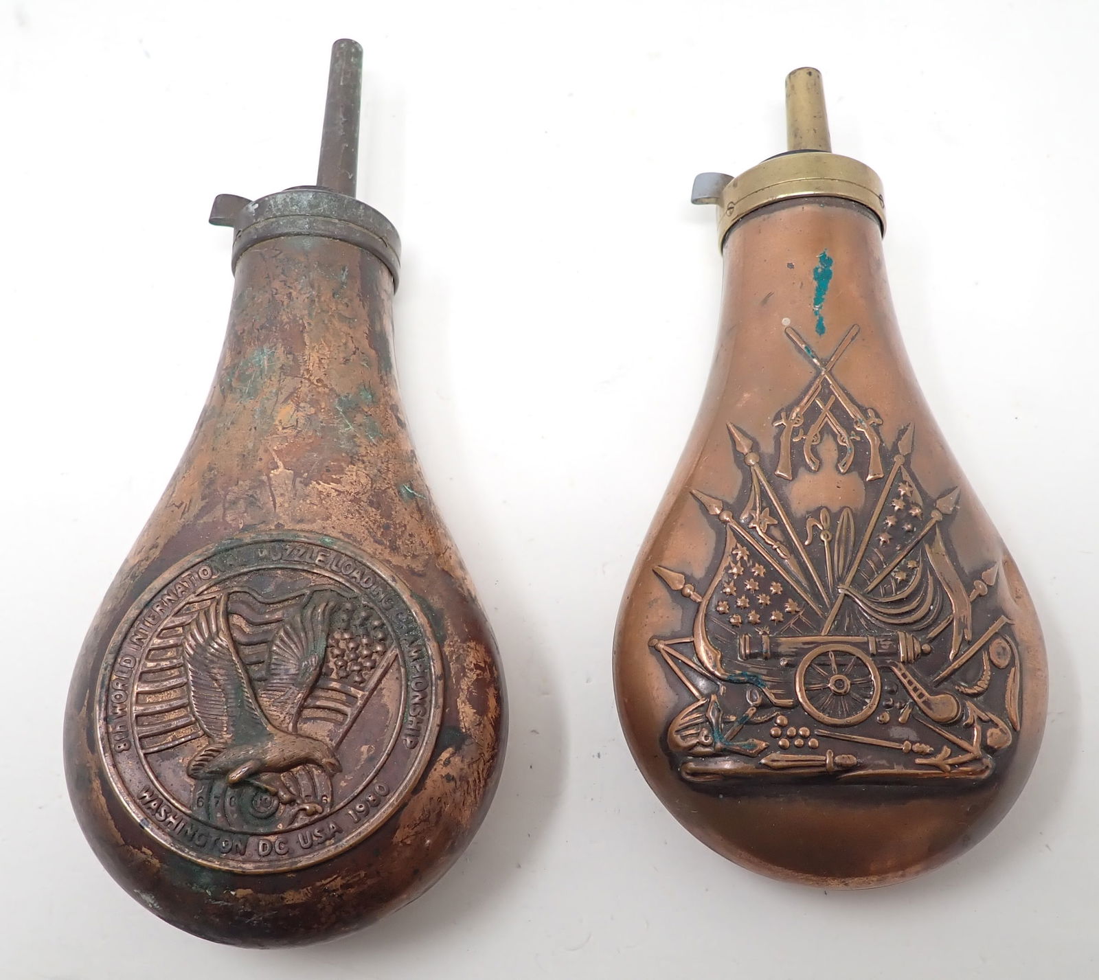 8th World International Muzzleloading Championship Powder Flask: 1980 Championship & Cannon w/ guns and flags powder flasks . Left one is apprx 3 1/4" x 8".