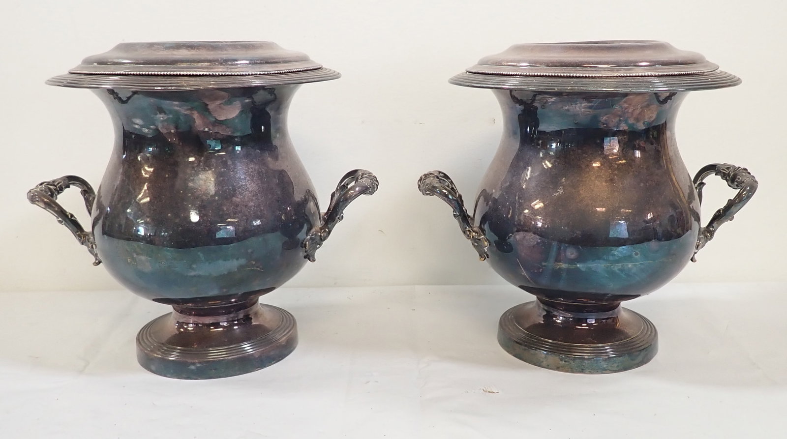 Pair of Silverplate Wine / Champagne Coolers: Apprx 9" in diameter and 10 1/2" tall. Shipping available
