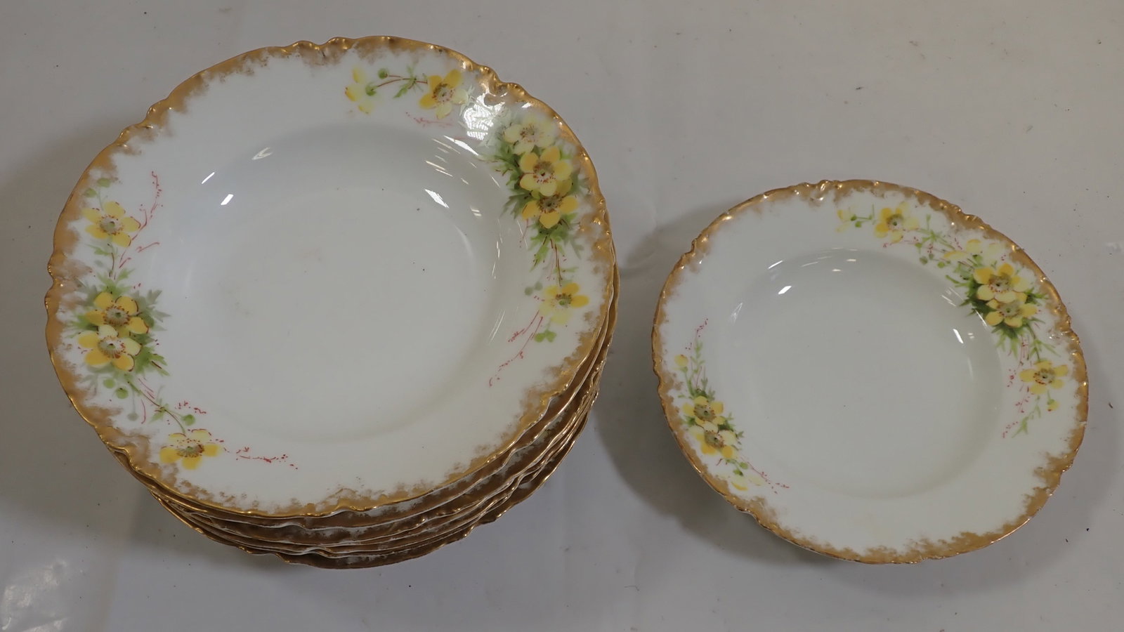 8 H&C Limoges Bowls: There are (7) 9" and (1) 7 3/4". Shipping available ( $25 handling fee).