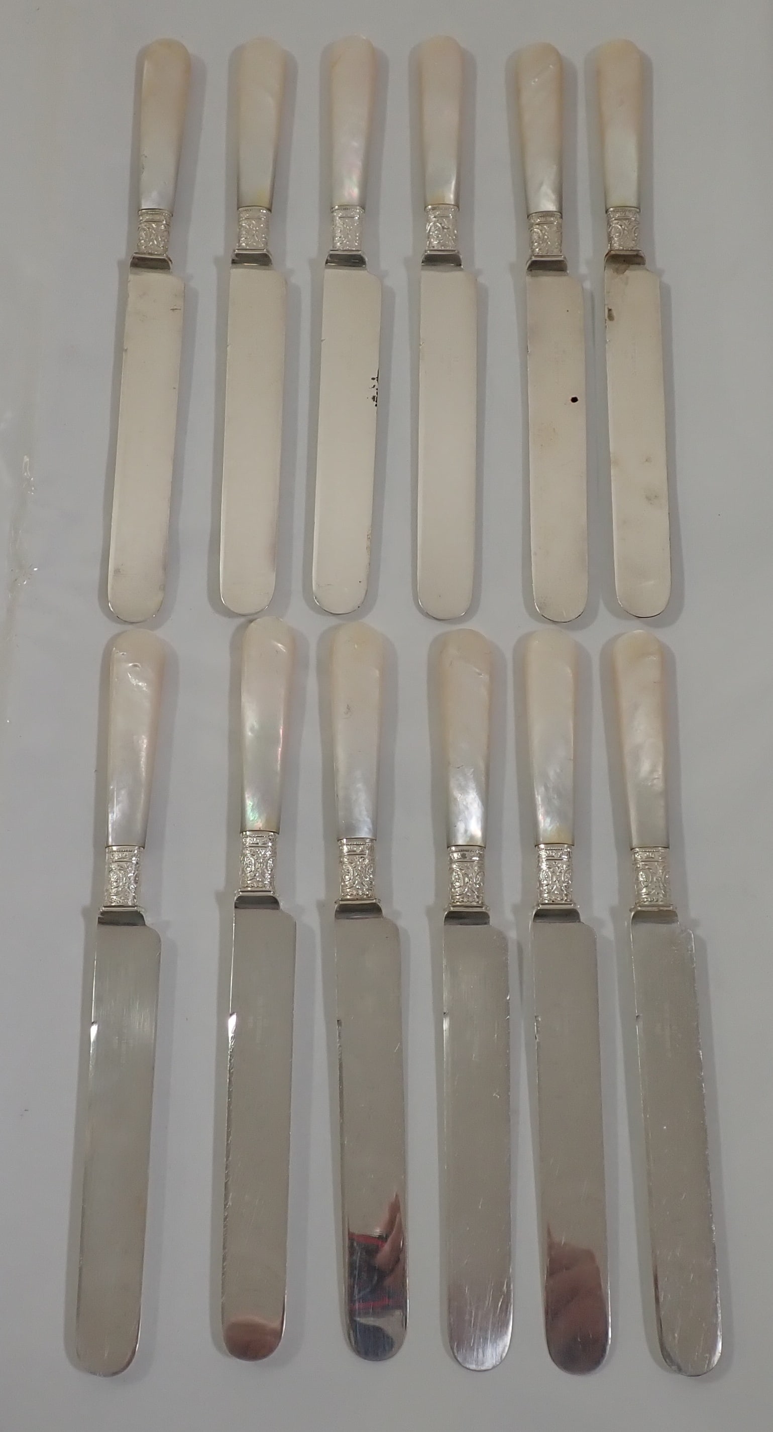 (12) 1834 J Russell Knives w/ Mother of Pearl Handles: Approx 9" long. Shipping available