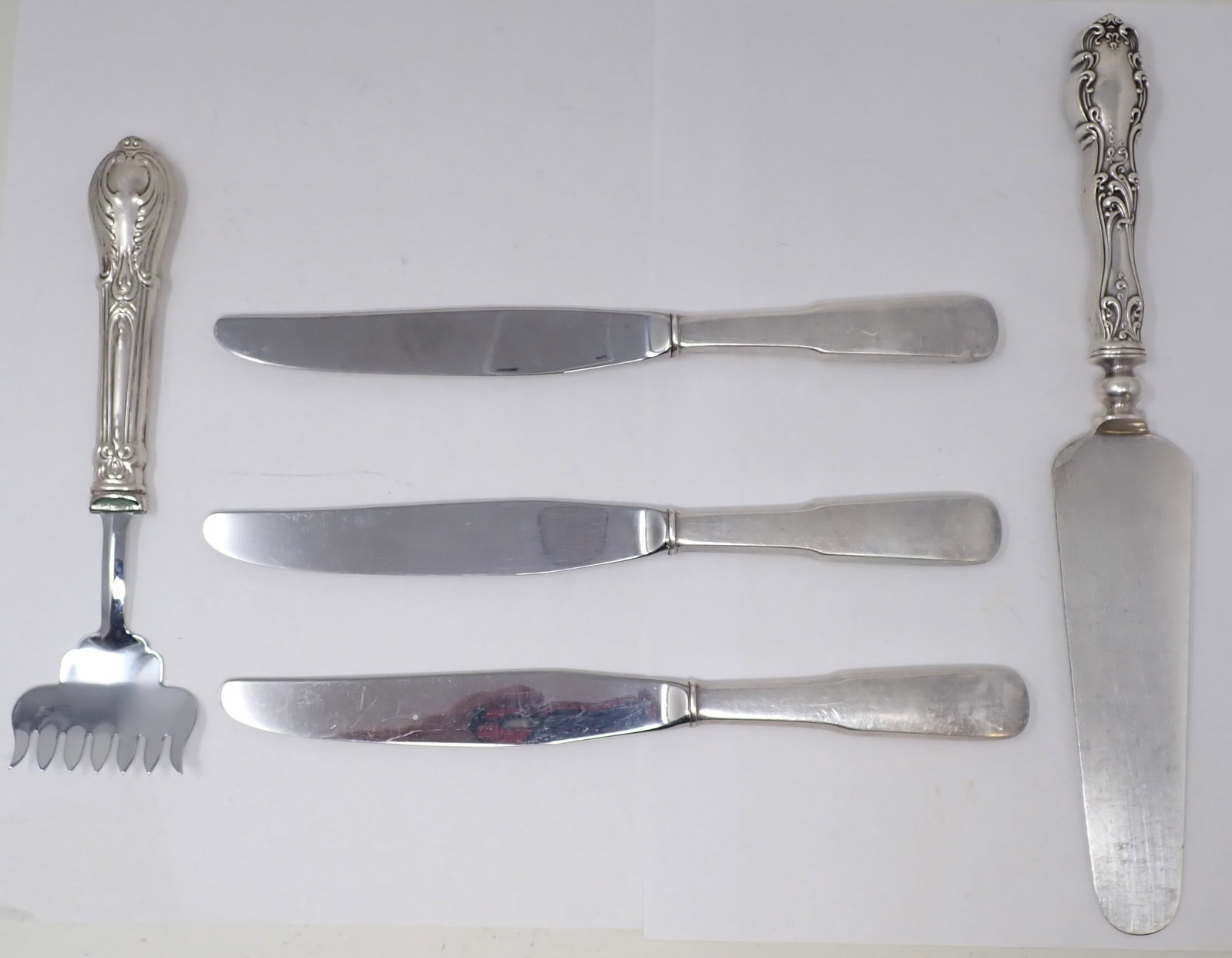 Knives & Sardine Fork w/ Sterling Silver Handles: Knives are apprx 8 7/8" long. Weight of knives and sardine fork are apprx 250 grams. Pie server is not marked and was not weighed.