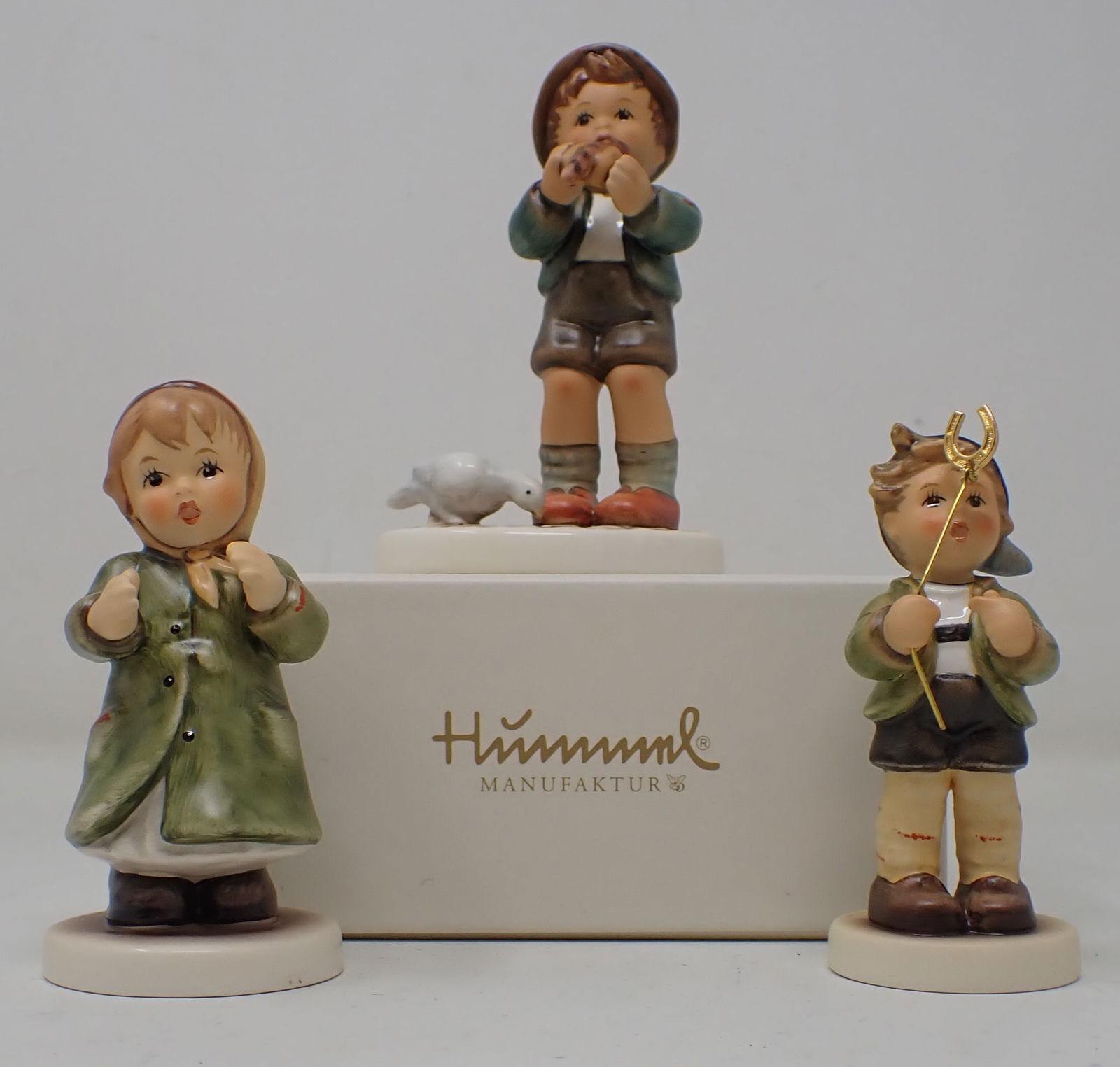 3 Goebel Hummels: Tallest is approx 4 1/4" . Shipping available