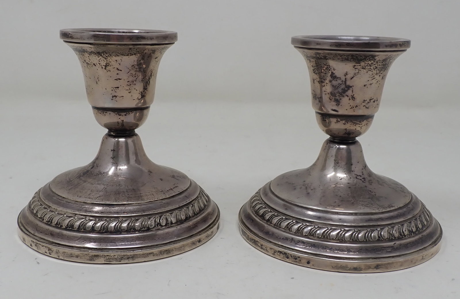 Sterling Silver 022 Candle Holders: Approx 4" in diameter and 3 3/4" tall. These are weighted . Weigh apprx. 860 grams. Shipping available