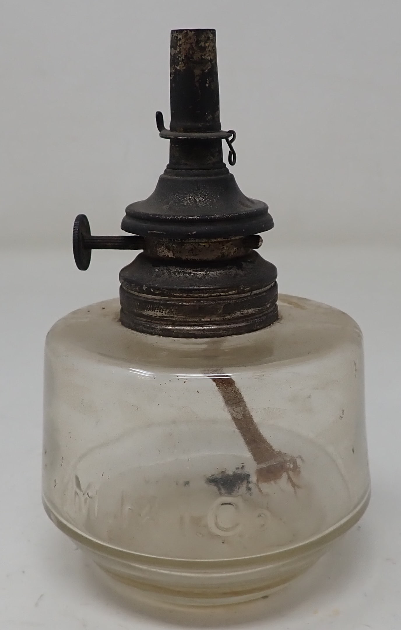 M.M.I Oil Lamp: Approx 3" in diameter and 5" tall. Shipping available
