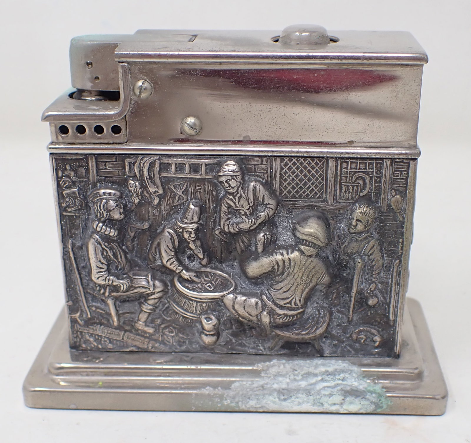Repousse Tavern Scene Table Lighter: Apprx 1 3/4" x 3 1/2" x 2 7/8" tall. Shipping available