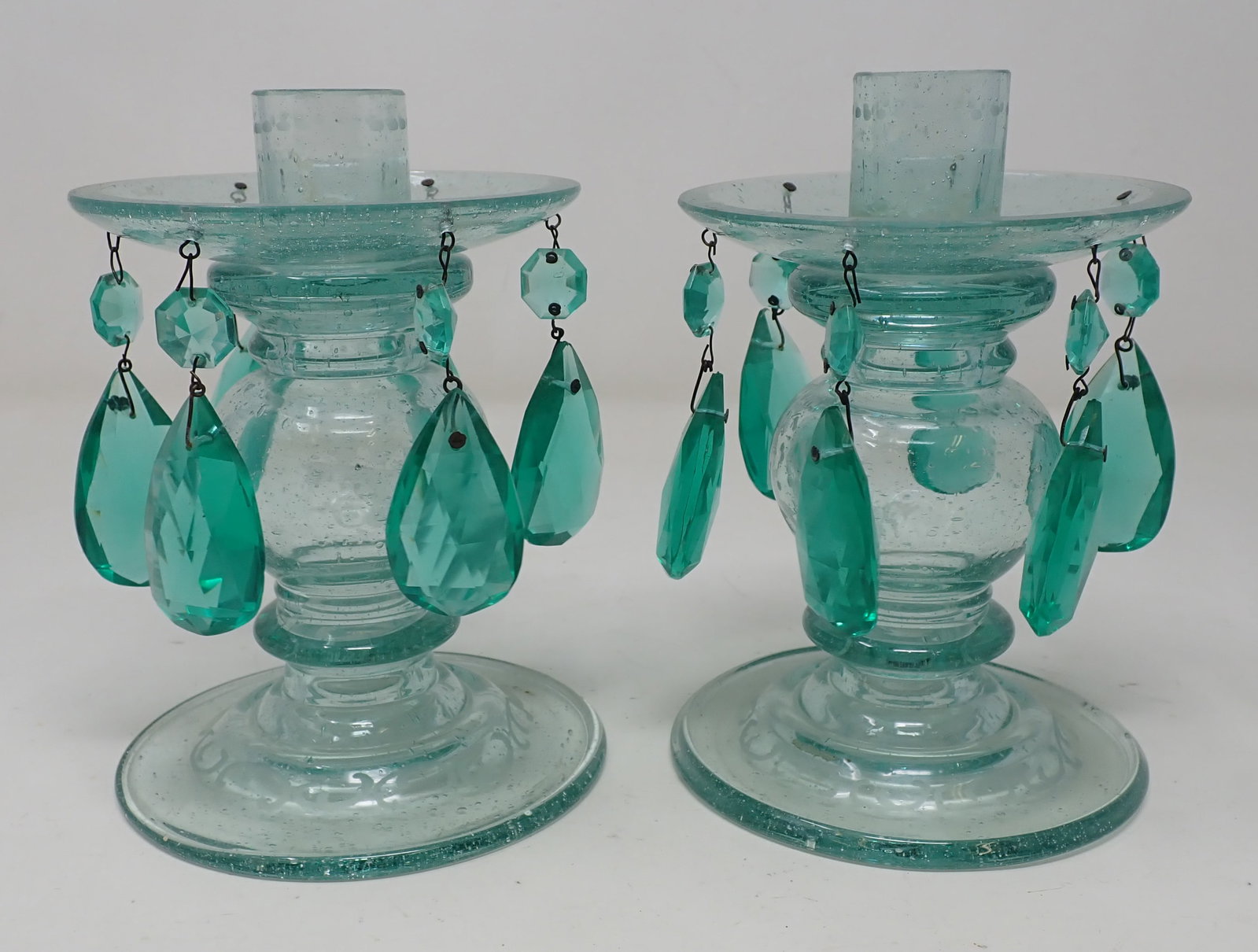 Aqua Glass Candle Holders Etched w/ Ships: Approx 4 1/4" in diameter and 6 1/2" tall. Shipping available ( $20 handling charge).