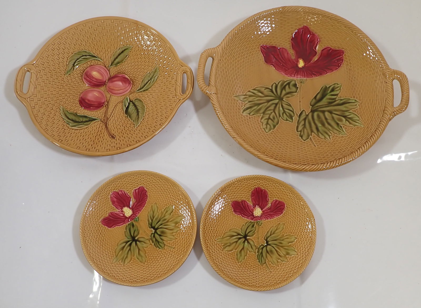 German Ceramic Flower Plates: Largest is approx 11 1/2" in diameter. Shipping available