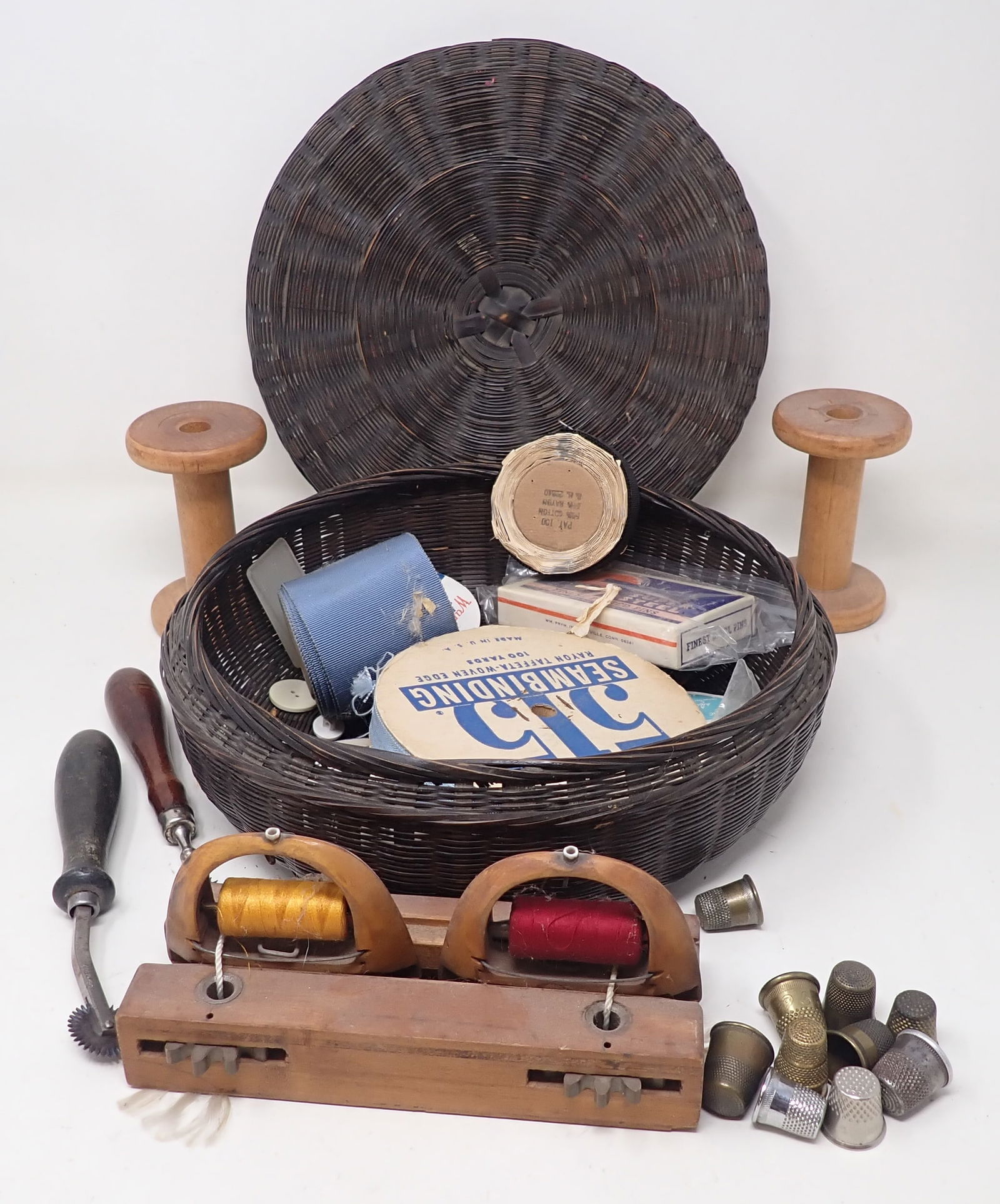 Sewing Basket Shuttle Thimbles Spools: Basket is approx 9 1/2" in diameter and 3 1/4" tall. Shipping available