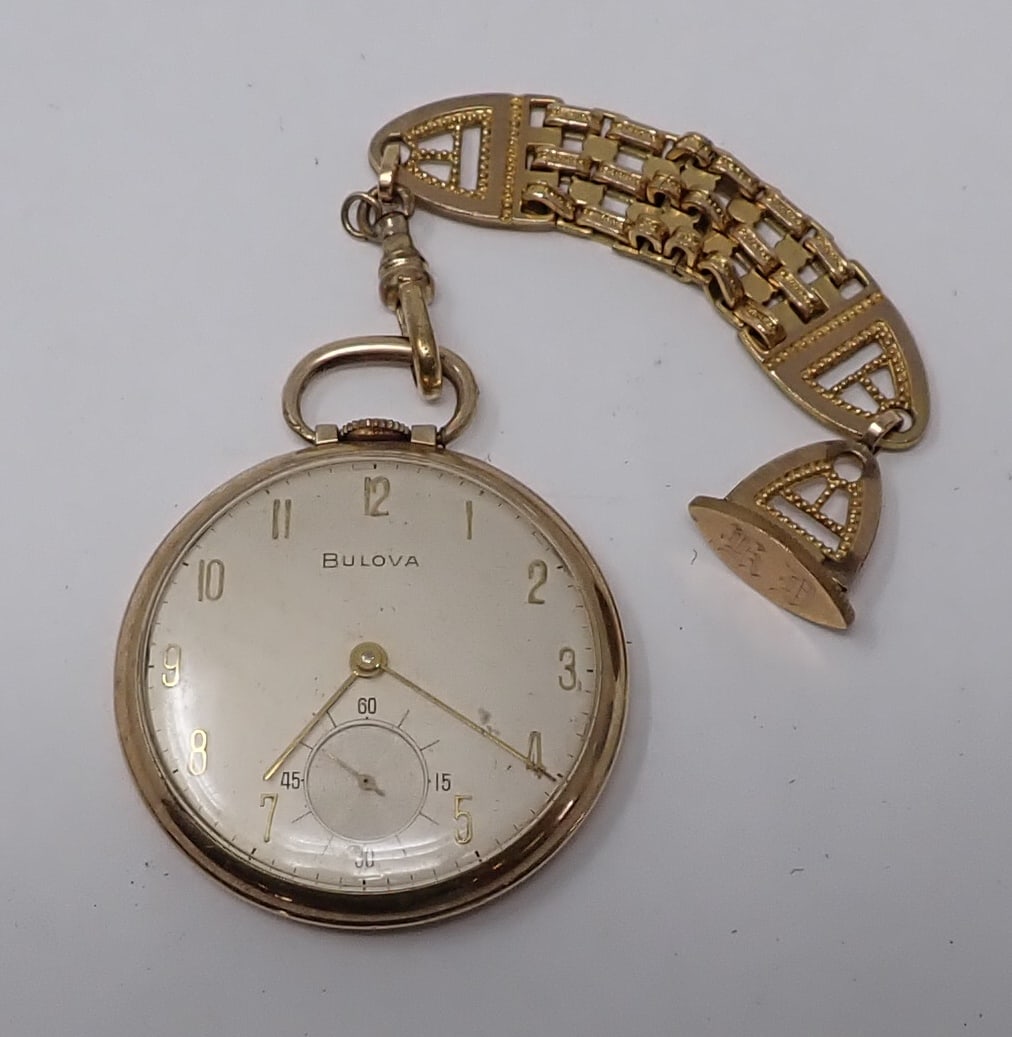 10k Rolled Gold Plate Bulova Pocket Watch: Apprx 1 5/8" in diameter. Shipping available