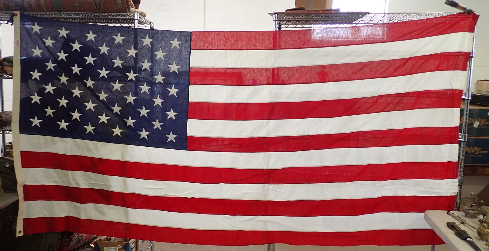2 American Flags: #1 55" x 9'6" , #2 56" x 10'. Shipping available