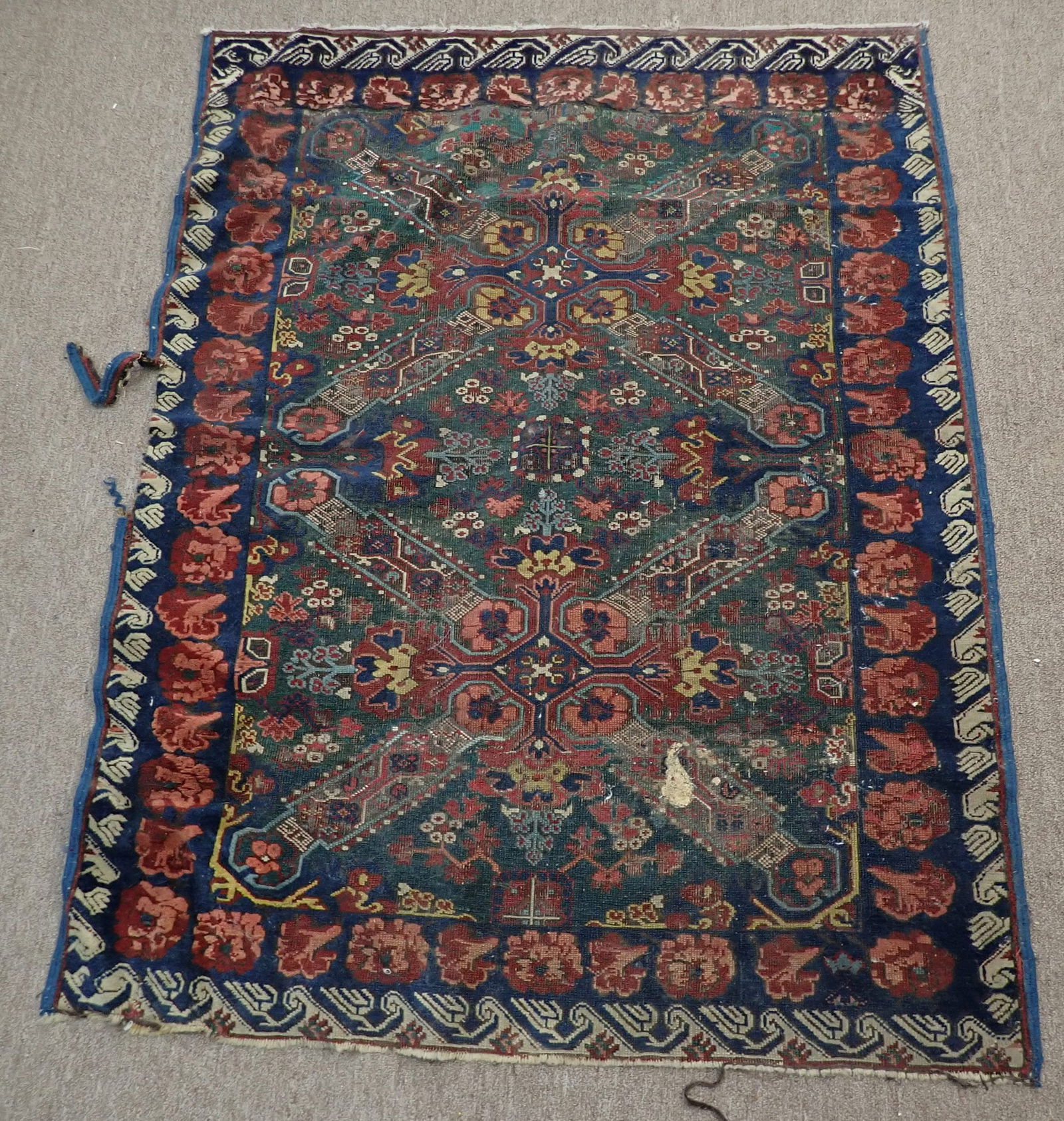 Worn & Torn Persian Rug (1 of 6)