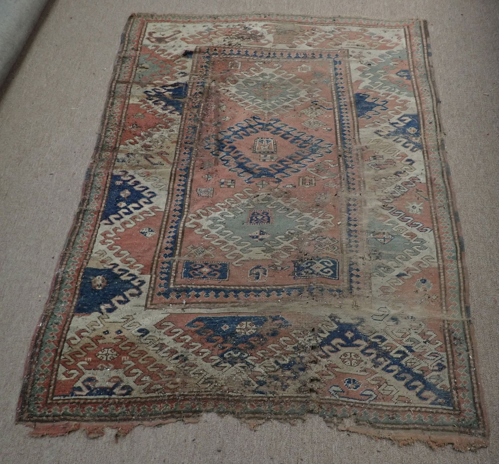 Worn Torn & Damaged Persian Rug (1 of 7)