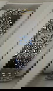 Lady's Lucien Piccard Wrist Watch: Style 26946SL, stainless steel mesh bracelet style with approx. 56 count accent diamonds, overall approx. 8" length, appears to be unused or like new condition. Housed in original display box and oute