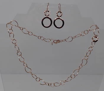 Ippolita Rose Necklace and Earrings: Sterling rose gold plated with circle motif; matching earrings.